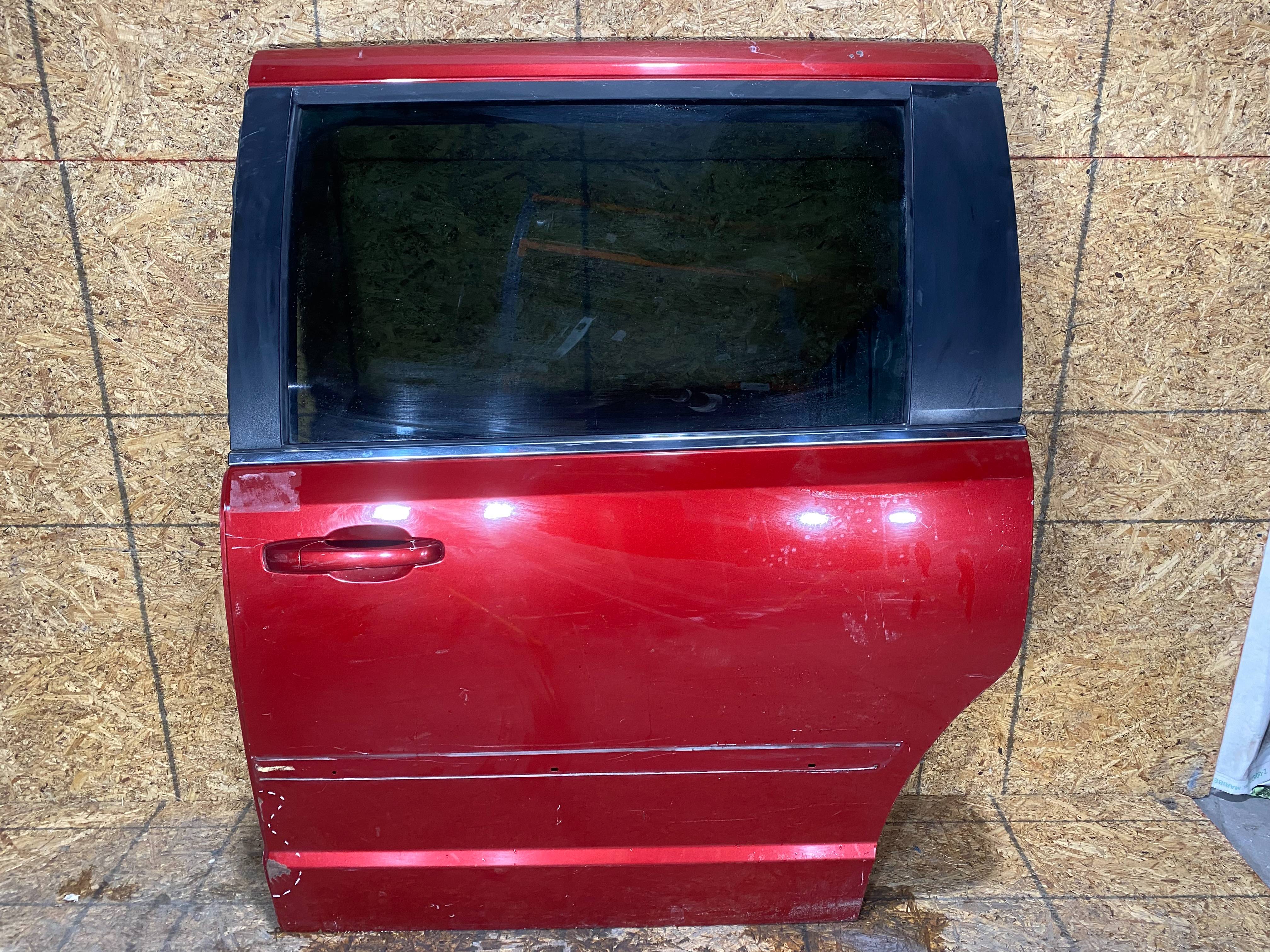 Dodge Grand caravan 2008 - 2018 Puerta Trasera Izquierdo Usado Original - vista 1