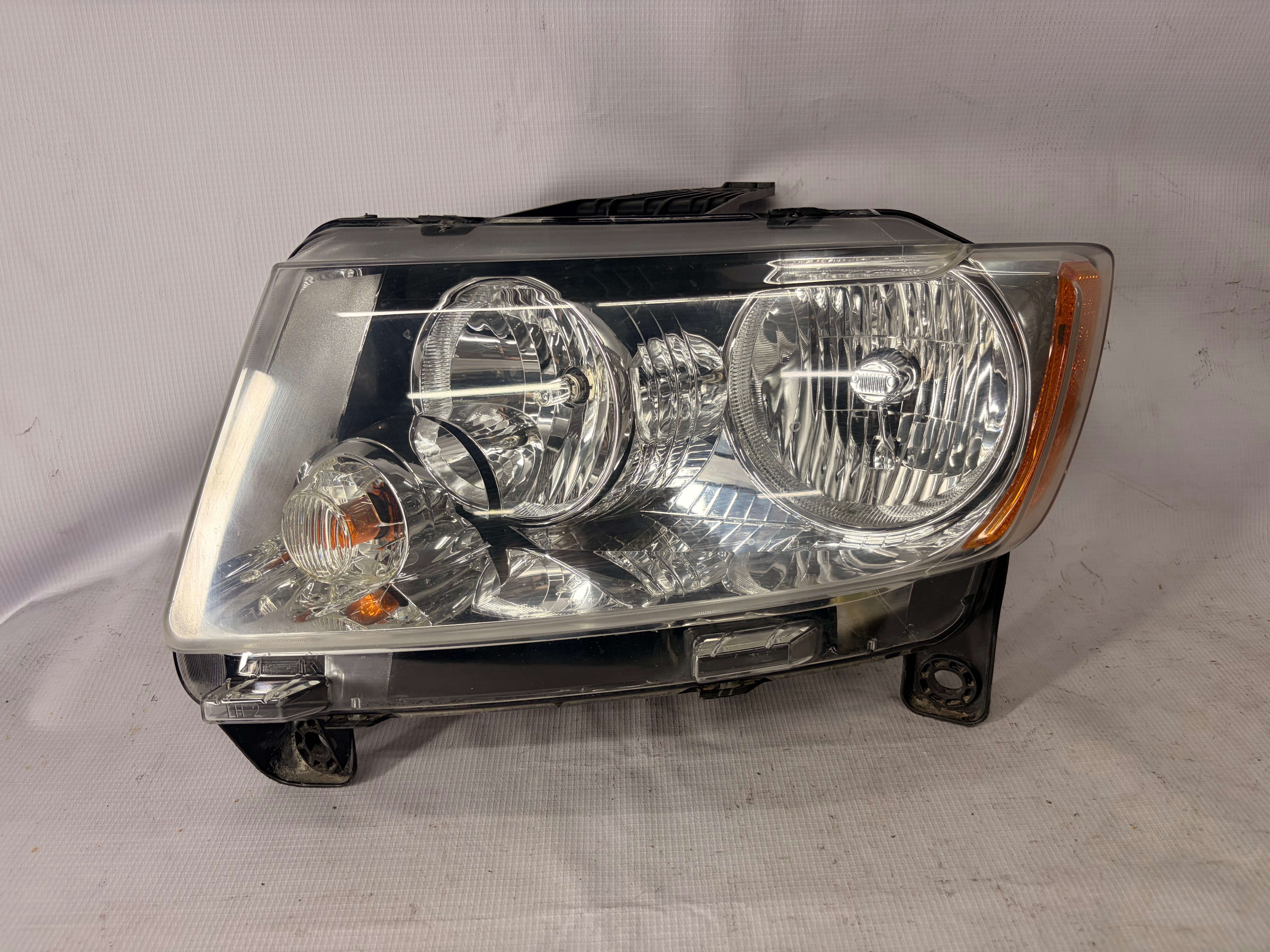 Jeep Grand cherokee 2011 - 2013 Faro Izquierdo Usado Generico