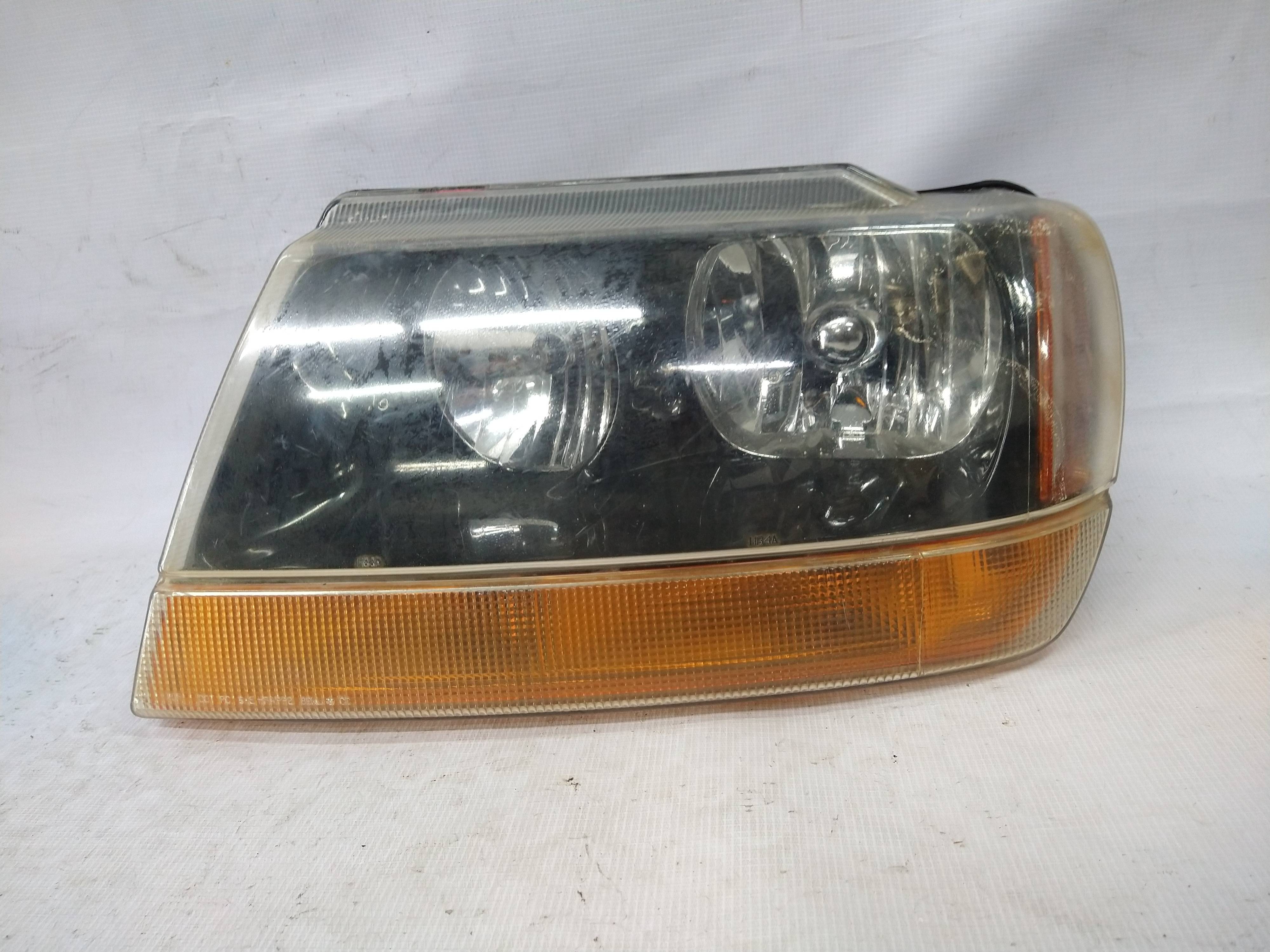 Jeep Grand cherokee 1999 - 2004 Faro Izquierdo Usado Original